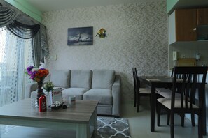Classic Apartment, 2 Bedrooms | Living area | TV