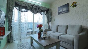 Classic Apartment, 2 Bedrooms | Living area | TV