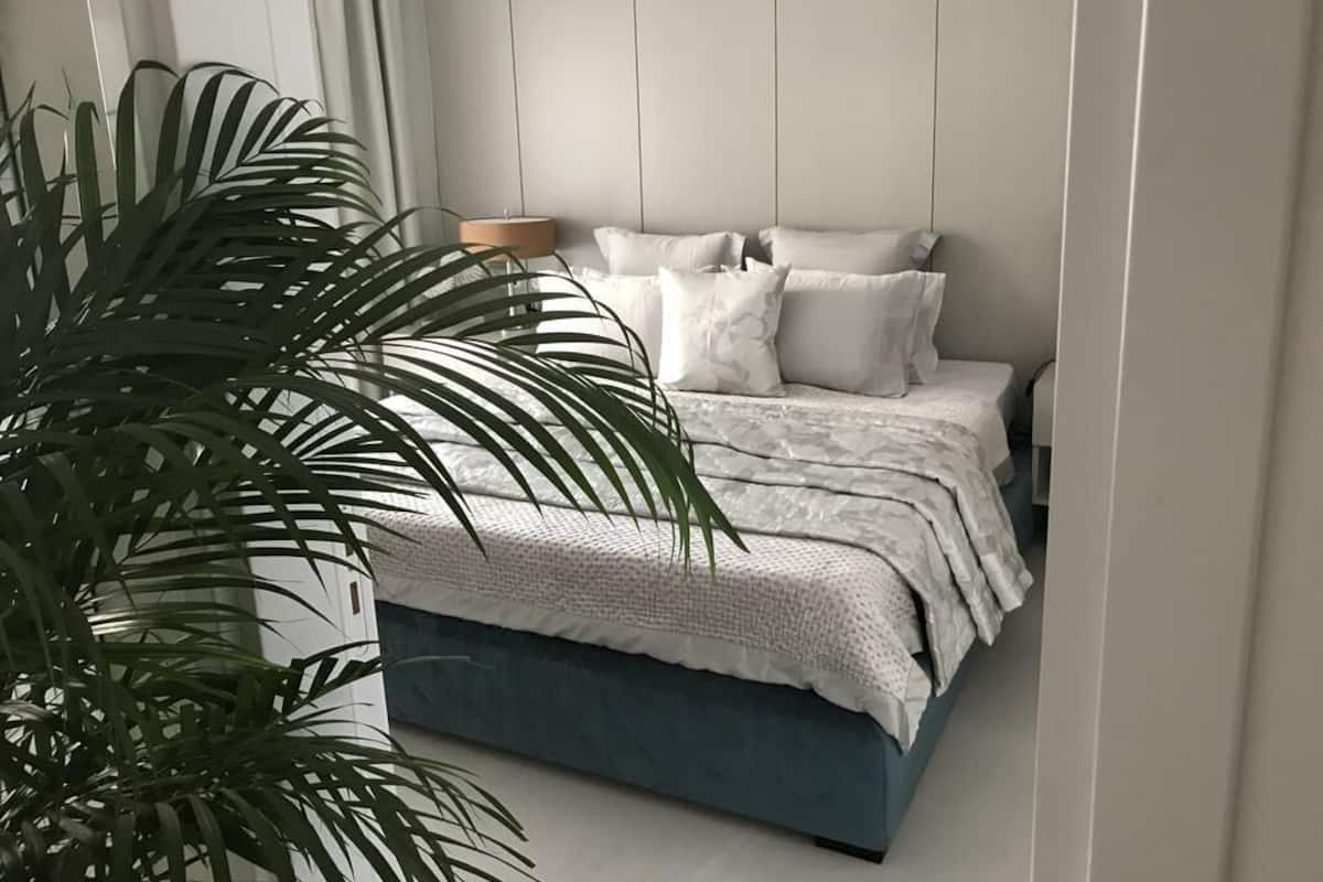 Apartment, 1 Bedroom, Courtyard View | 1 bedroom, in-room safe, soundproofing, iron/ironing board