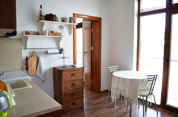 Economy Studio, Balcony | Private kitchen | Fridge, oven, stovetop, electric kettle