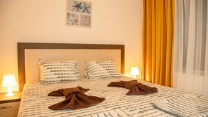 Deluxe Apartment, 2 Bedrooms, Balcony, Sea View | 2 bedrooms, cribs (surcharge), WiFi (free), bed sheets - FM Deluxe 2-BDR Apartment with Pool & Sea View in Sun Resort (Tsarevo)