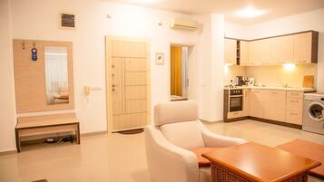 Deluxe Apartment, 2 Bedrooms, Balcony, Sea View | Private kitchen | Fridge, oven, stovetop, coffee/tea maker