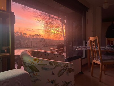 Rural garden house with fireplace and natural panorama