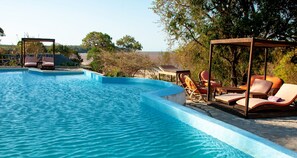 Outdoor pool, pool umbrellas, pool loungers