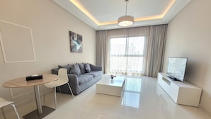 Superior Suite, 1 Bedroom | Living area | LCD TV - The Jewel Hotel (Manama)