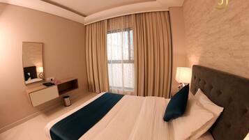 Copriletto in piuma, una cassaforte in camera, tende oscuranti