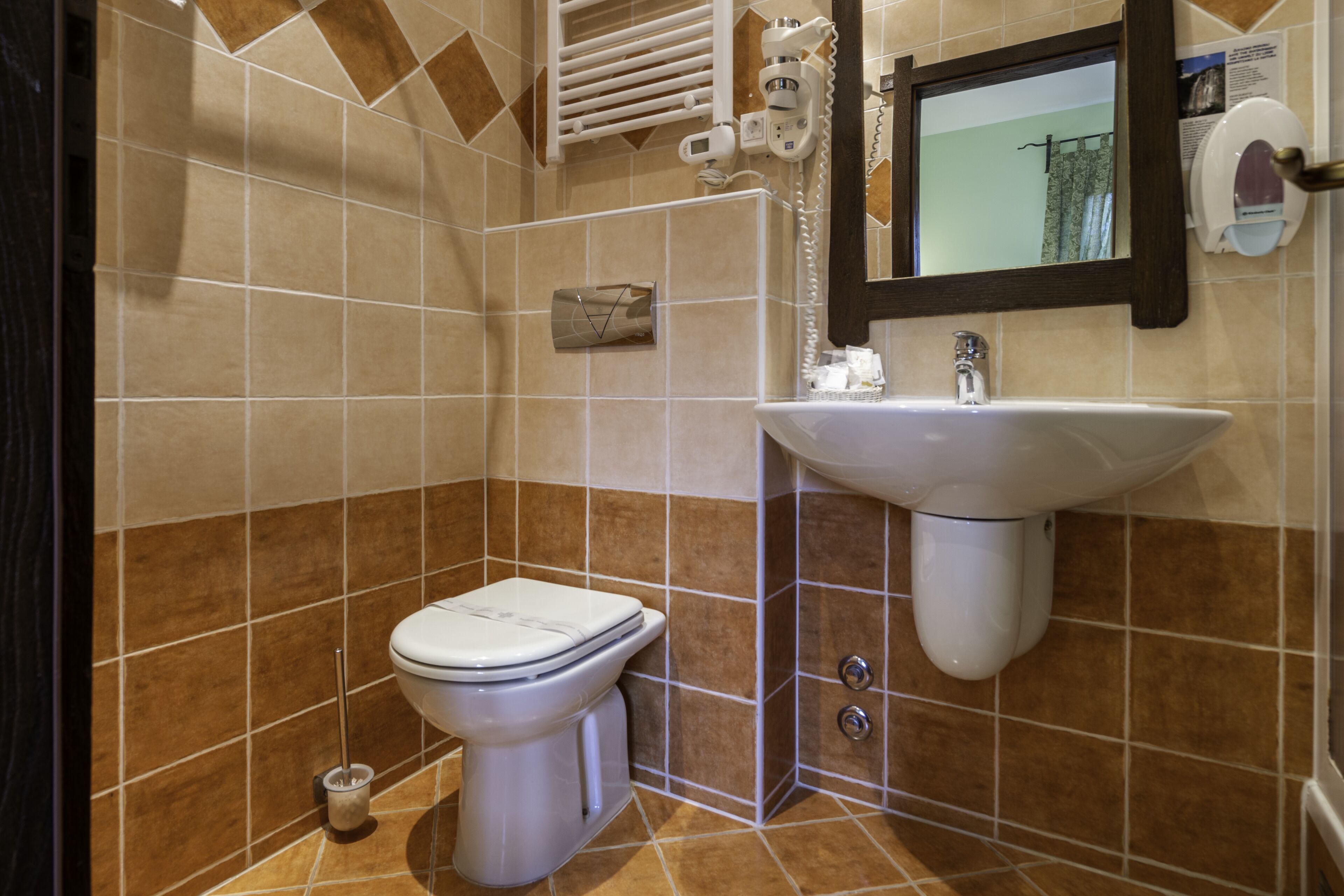 single room | bathroom | shower, hair dryer, towels, soap