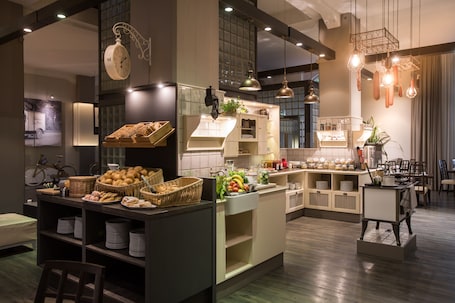 Daily buffet breakfast (EUR 23 per person)