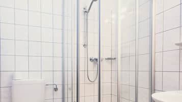 Ducha, toallas, papel higiénico