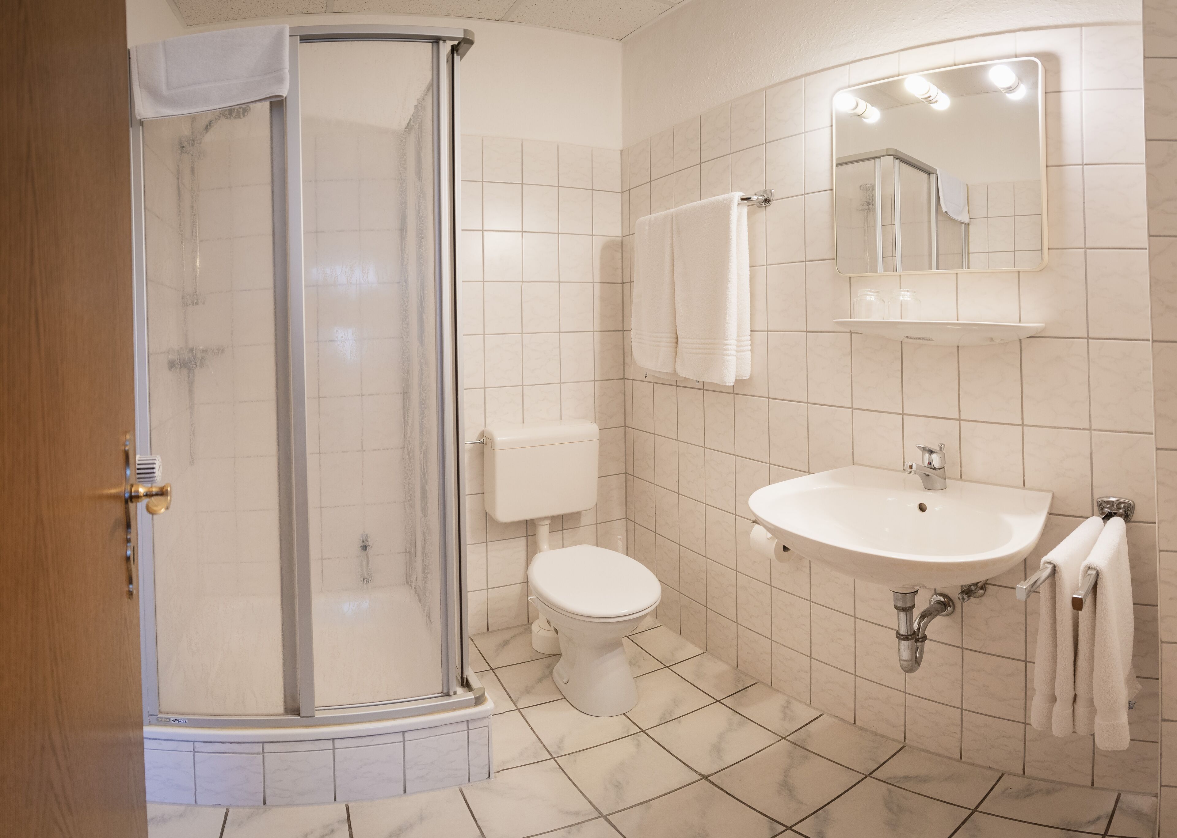 shower, towels, toilet paper