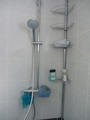 Shower, hair dryer, towels, soap