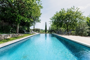Seasonal outdoor pool, pool loungers