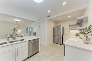 Fridge, microwave, dishwasher, coffee/tea maker