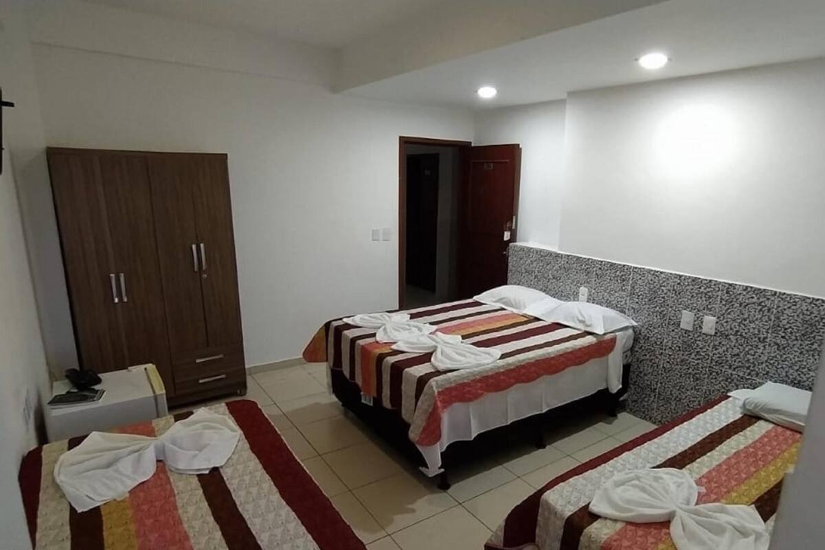 Phòng 4 Economy, nhiều giường | Minibar, truy cập Internet không dây miễn phí, bộ trải giường