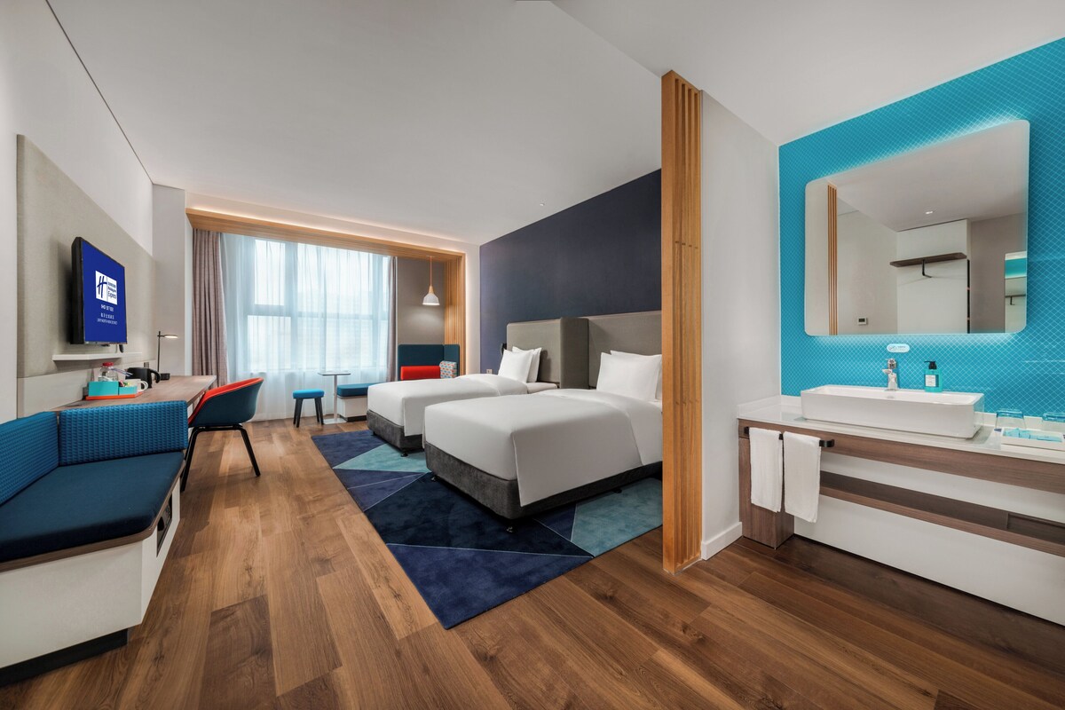 Premium bedding, down duvets, in-room safe, desk