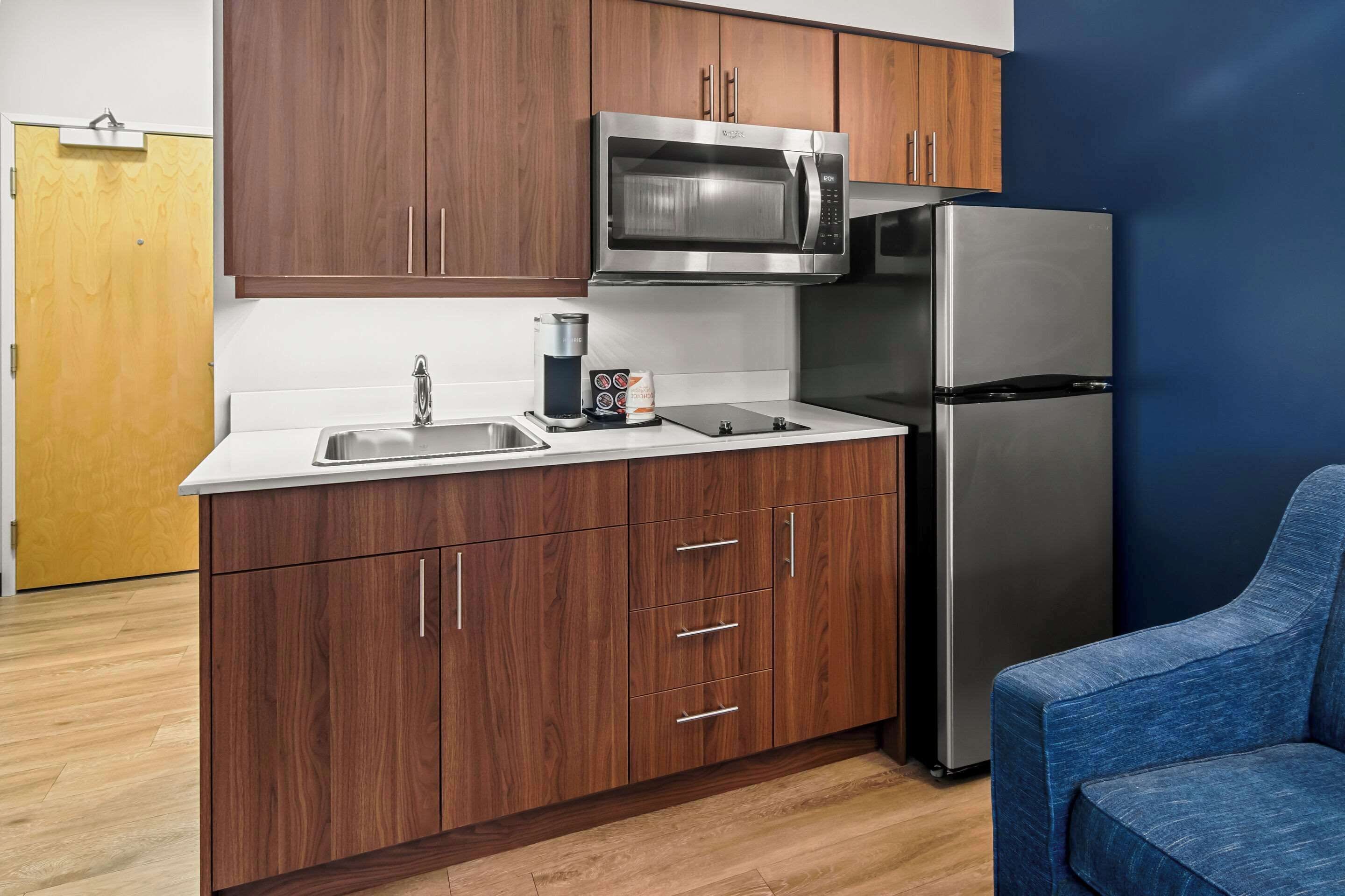 premium bedding, pillow-top beds, desk, laptop workspace