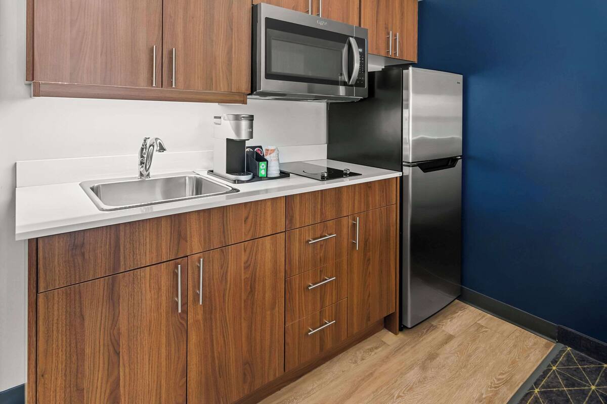 premium bedding, pillow-top beds, desk, laptop workspace