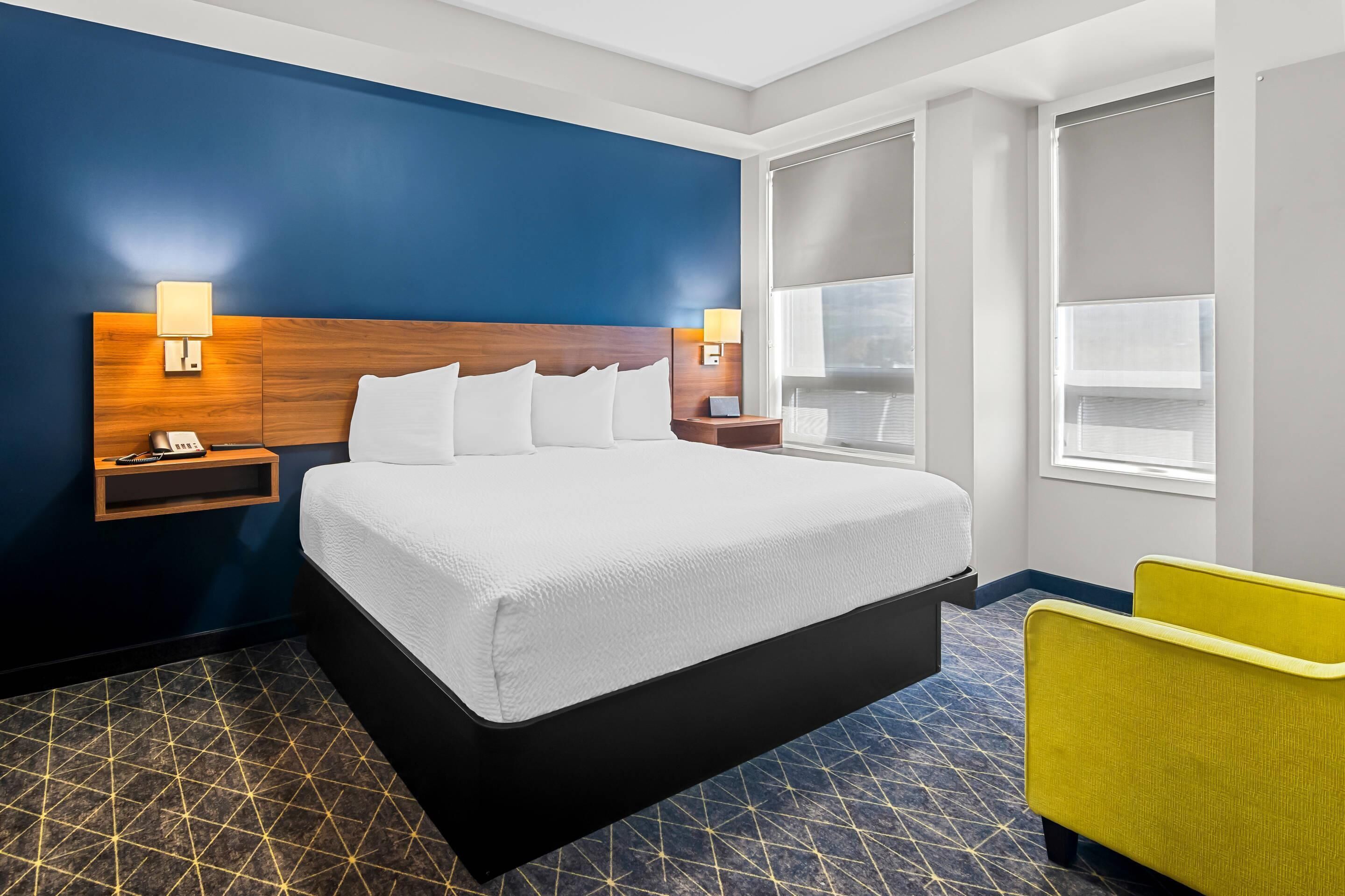 Premium bedding, pillowtop beds, desk, laptop workspace