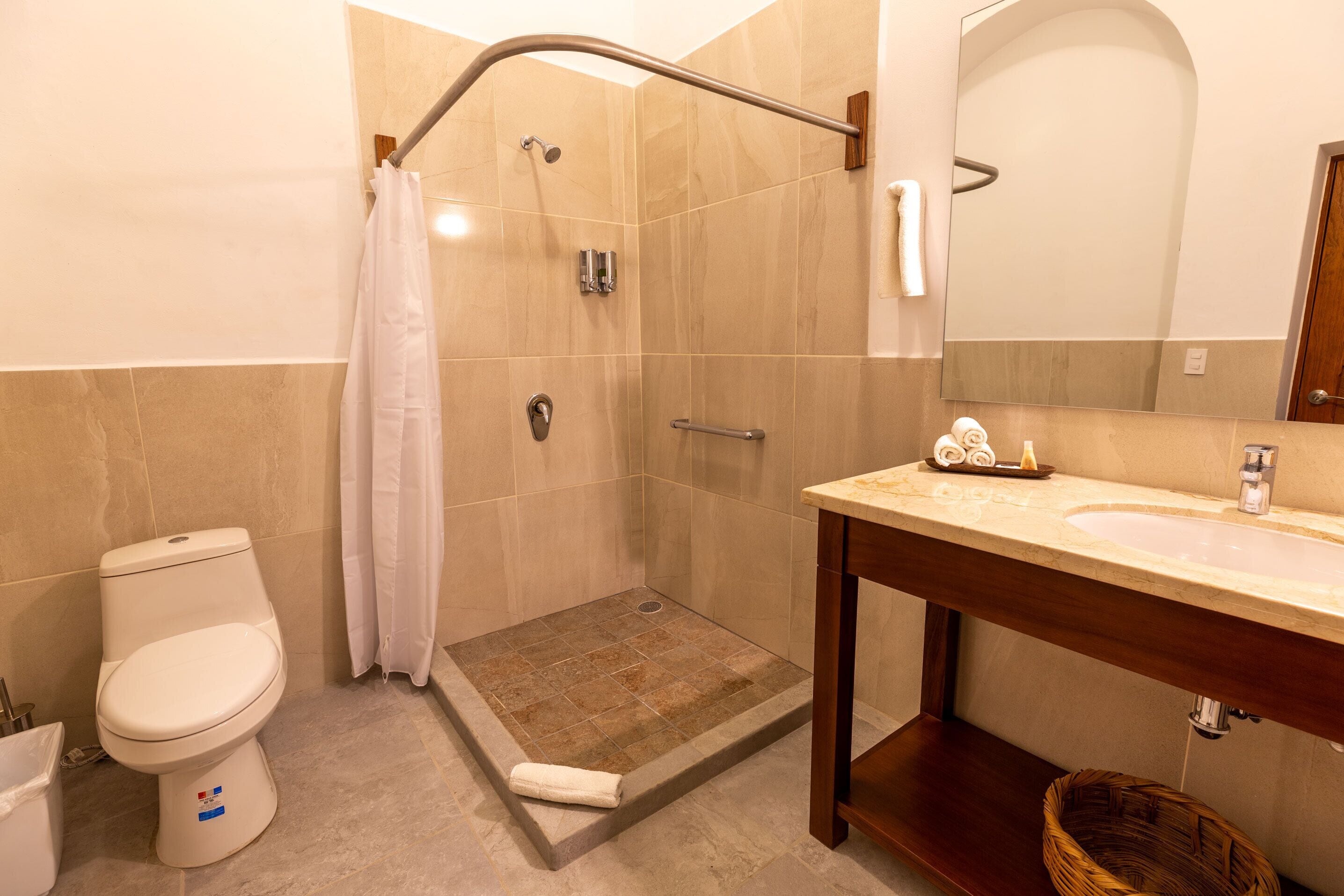 garden suite 7 | bathroom | hair dryer, towels, soap, shampoo