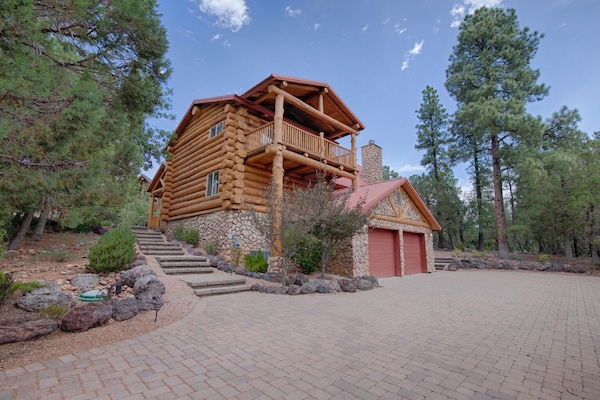 3 story large timber logs, master bedroom balcony, steps to front door