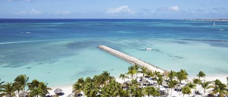 On the beach, sun-loungers, beach towels