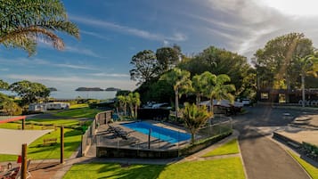 Outdoor pool, pool umbrellas, pool loungers