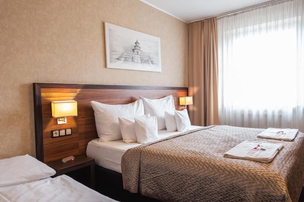 Triple Room (Extra bed) | Minibar, in-room safe, desk, laptop workspace