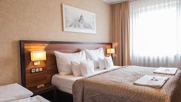 Triple Room (Extra bed) | Minibar, in-room safe, desk, laptop workspace