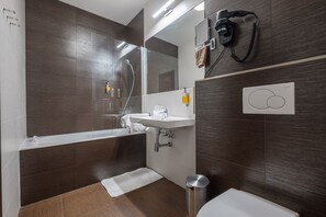 Comfort Double or Twin Room | Bathroom | Bathtub, eco-friendly toiletries, hair dryer, towels