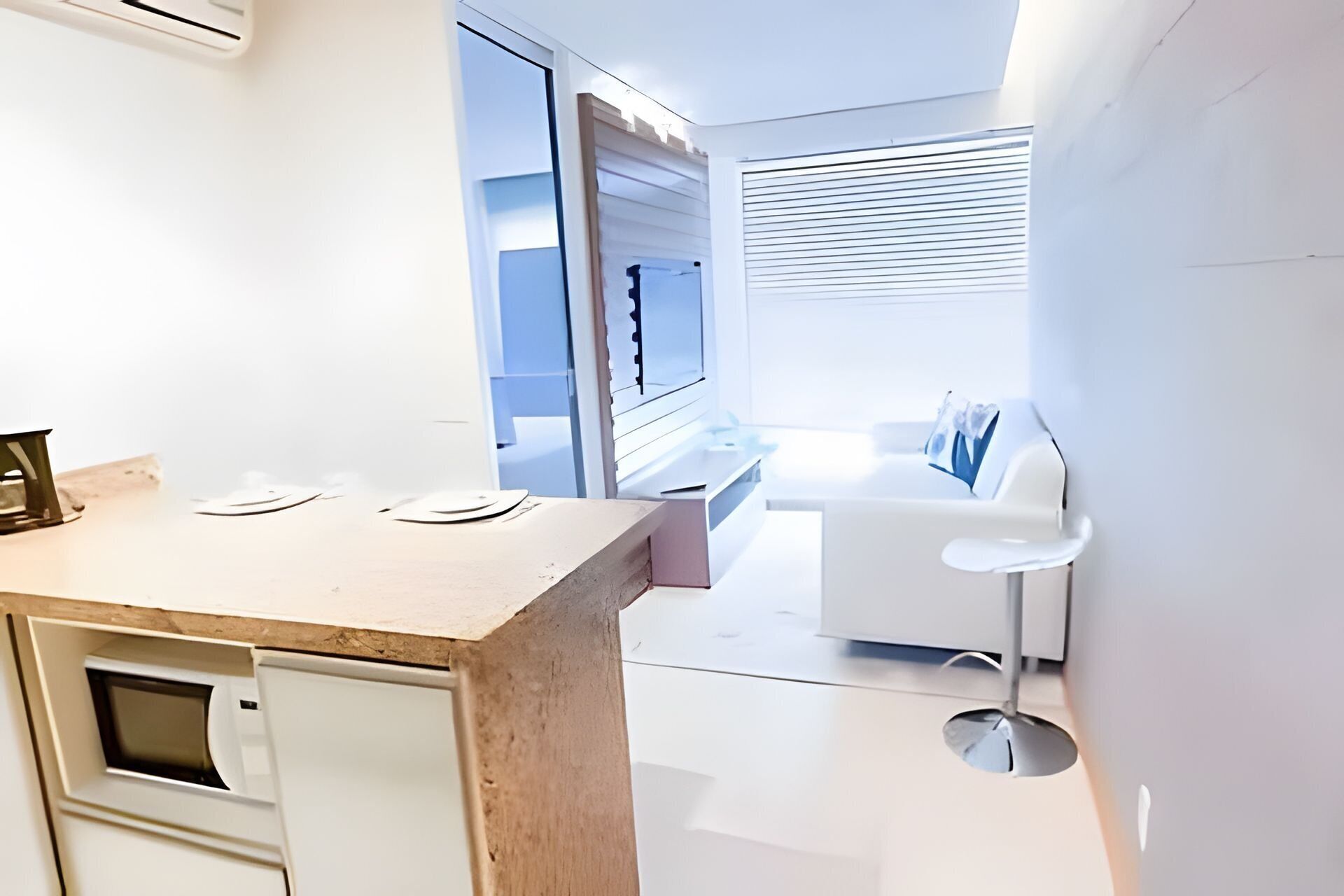 Apartamento | Cozinha privada | Geladeira, micro-ondas, talheres/pratos/utensílios de cozinha