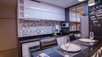 Apartment | Private kitchen | Microwave, stovetop, electric kettle, cookware/dishes/utensils