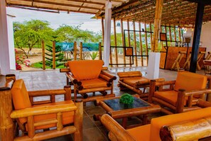 Breakfast, lunch, dinner served; local cuisine, pool views