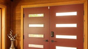 A wooden door with multiple rectangular glass panels and a black handle. - Unique Home Where The Buffalo Roam! Perfect for Families, Reunions. Hunters. (Buffalo Ridge)