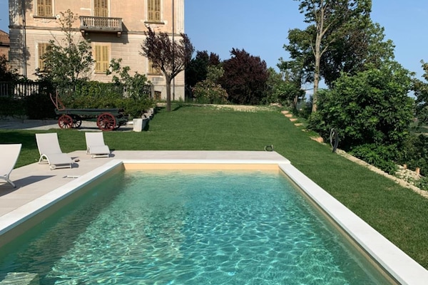 Seasonal outdoor pool, pool umbrellas, pool loungers