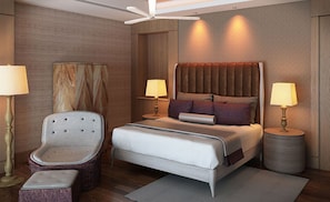 Relax in a stylish room with a large bed, bedside tables, and a plush armchair.