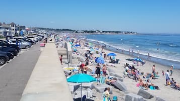 On the beach, sun loungers, beach towels