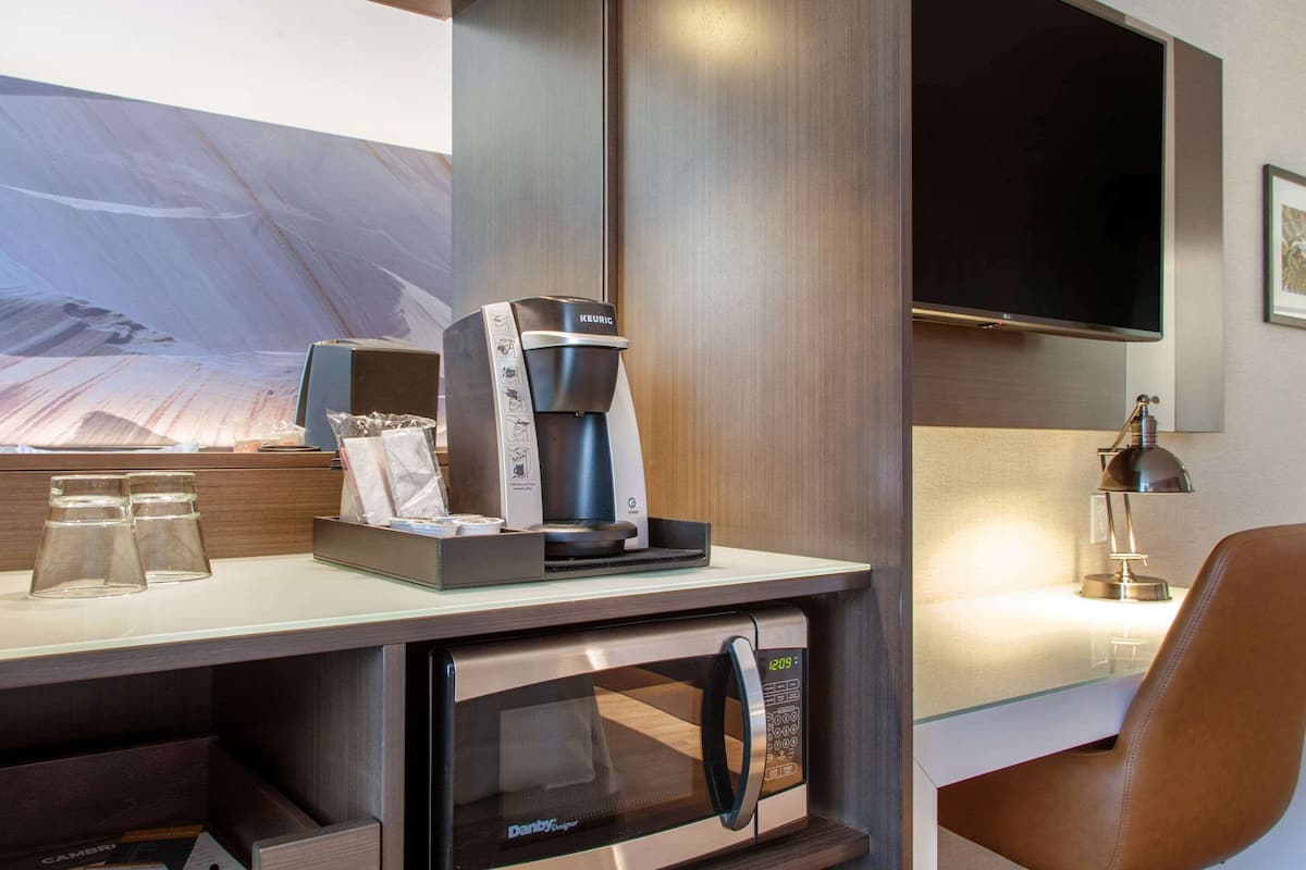 premium bedding, desk, laptop workspace, blackout curtains