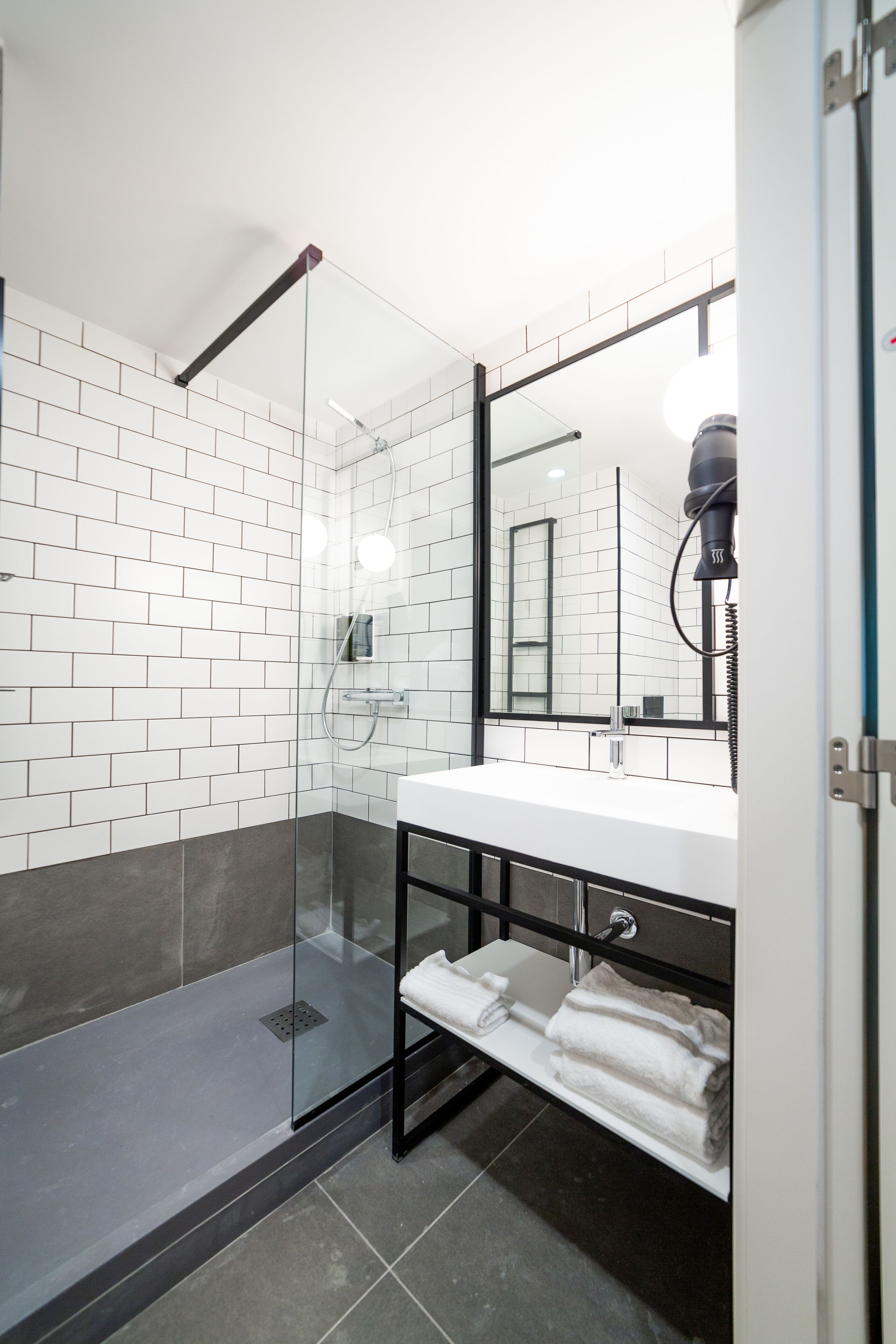 standard twin room, 2 single beds | bathroom | shower, eco-friendly toiletries, hair dryer, towels