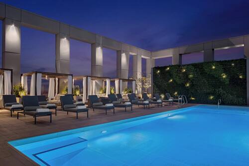 Outdoor pool, open 7:00 AM to 5:00 PM, pool cabanas (surcharge)