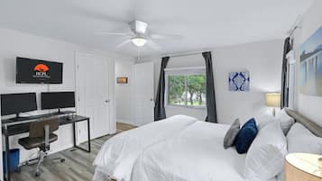 Bedroom one has a king size bed and an ensuite bathroom. Also, there is a dedicated workspace in this room.