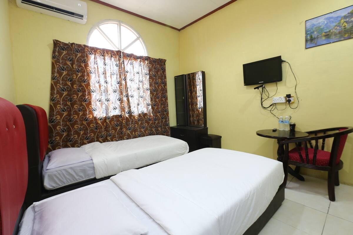 Chambre Deluxe avec lits jumeaux | Bureau, Wi-Fi gratuit, draps fournis