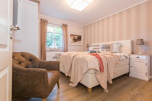 1 غرفة نوم وخزنة داخل الغرفة ومكواة/لوح كي وواي فاي