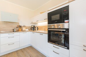 Fridge, dishwasher, coffee/tea maker, electric kettle