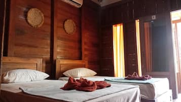 Meja kerja, tempat tidur lipat/tambahan, Wi-Fi gratis, dan seprai linen