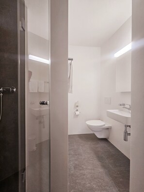 Triple Room | Bathroom | Shower, hair dryer, towels, soap