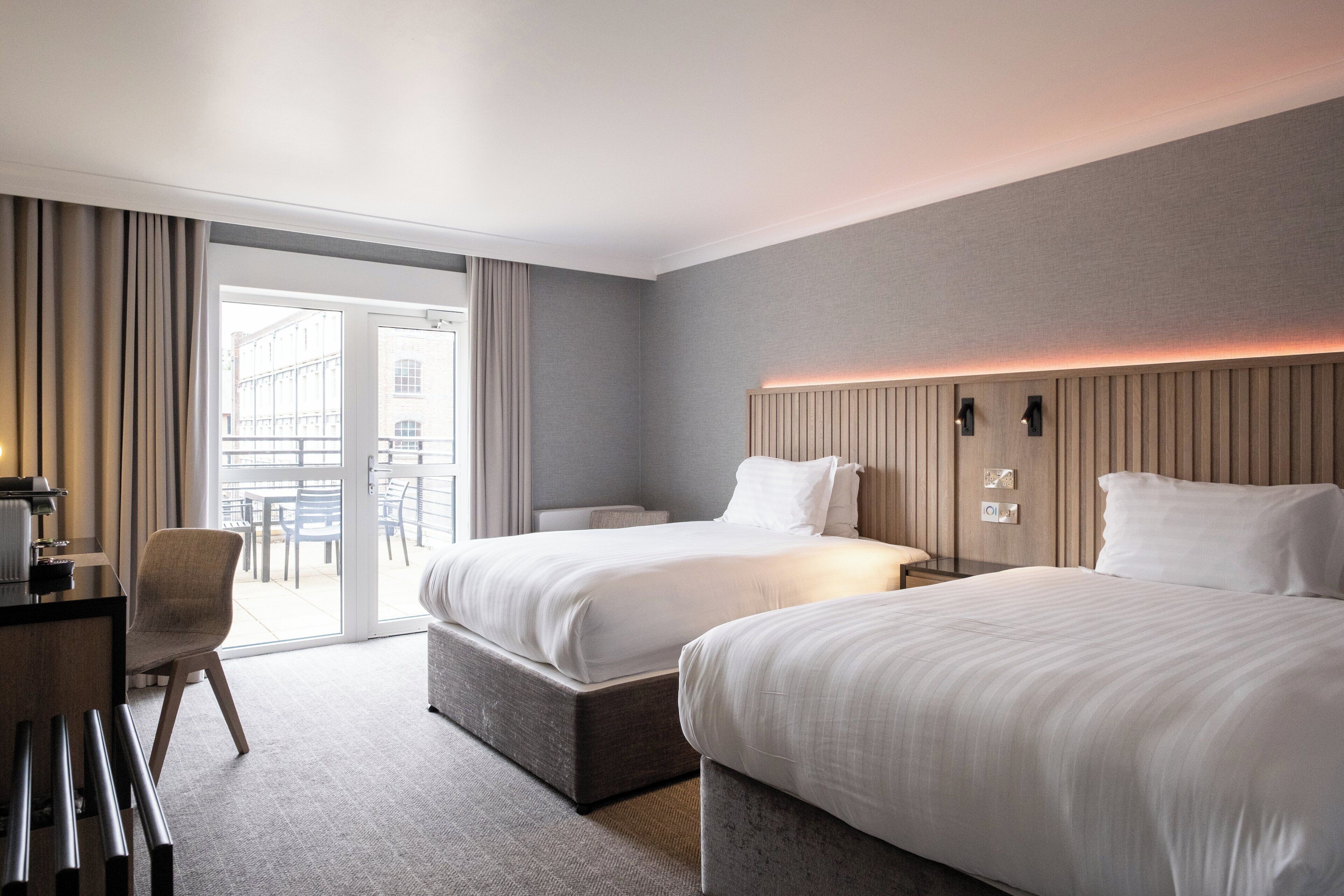 Deluxe Suite, 2 Double Beds, Balcony (Quay View) | In-room safe, desk, laptop workspace, soundproofing