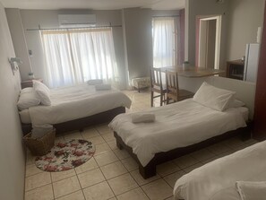 Family Room (Grey) | Desk, iron/ironing board, free WiFi, bed sheets