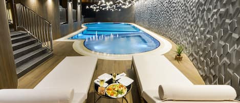 Indoor pool, open 8:00 AM to 10:00 PM, sun loungers