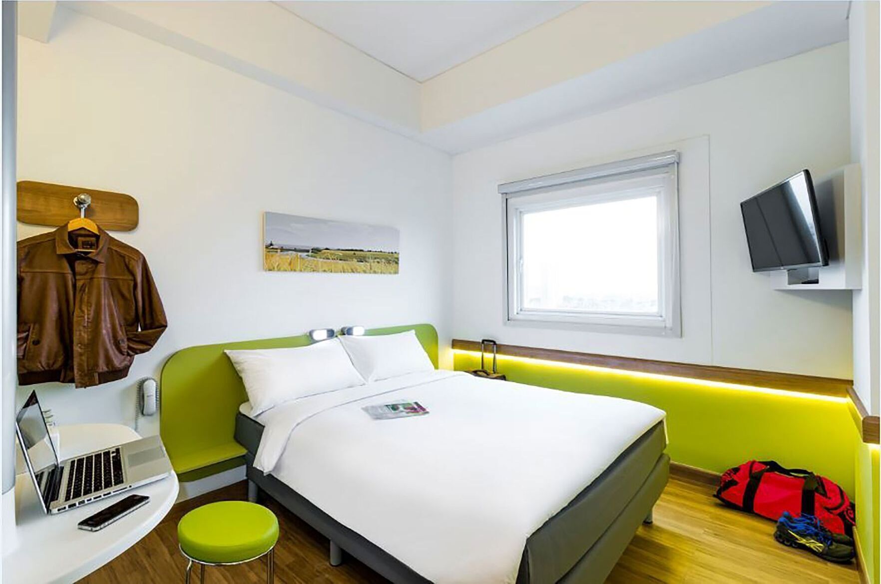 Premium bedding, desk, laptop workspace, soundproofing
