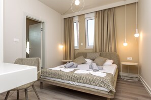 4 habitaciones, caja de seguridad en la habitación y escritorio